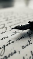 Vintage fountain pen nib with ink droplet resting on handwritten manuscript text, shallow depth of field for writing, literature, and correspondence concepts.