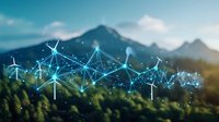 Wind turbines in mountain landscape with glowing blue network connections overlay, representing smart grid and renewable energy technology advancement.