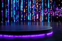 Empty circular stage platform with glowing purple LED trim against dark background with hanging blue light strips and bokeh effects creating magical atmosphere.