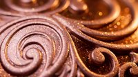 Rich chocolate swirl texture with golden sparkles and glossy finish for dessert backgrounds, confectionery designs, and luxury food packaging applications.