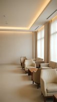Modern minimalist waiting room with beige leather chairs and warm LED ceiling lighting for healthcare or business interior design.