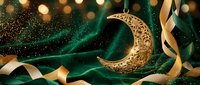 Golden crescent moon ornament with intricate patterns on emerald green silk fabric with bokeh lights and ribbons for festive celebrations.