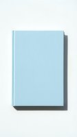 Light blue hardcover notebook with blank cover isolated on white background, suitable for branding, stationery design, and educational materials.
