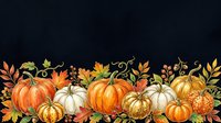 Autumn harvest arrangement featuring orange and white pumpkins with decorative fall foliage and leaves on dark background for seasonal designs.