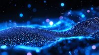 Glowing blue particles forming abstract wave pattern against dark background with bokeh lights and sparkle effects creating magical atmosphere.