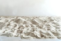Minimalist white sand dunes stretching to horizon create abstract natural patterns and textures in desert landscape, soft morning light enhances sculptural shapes.