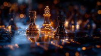 Chess pieces on reflective surface with dramatic lighting and bokeh effects create atmospheric mood for strategy and leadership concepts in business or gaming designs.