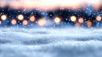 Magical winter background with glowing bokeh lights and sparkling snow surface against dark blue sky. Festive holiday scene with soft focus effect and copy space.