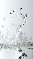 Dynamic water splash with floating droplets captured in high-speed photography against light gray background, showing crystalline clarity and motion.