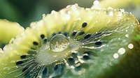 Fresh kiwi slice with water droplets in macro photography showing juicy texture and natural patterns, morning dew creates sparkling effect on green fruit surface.