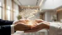 Young male and female professionals in business attire joining hands over glowing city hologram, symbolizing partnership, collaboration, and urban development in modern office environment.