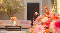 Elegant floral arrangement with pink roses and mixed blooms in modern living room interior for home decor and lifestyle photography.
