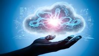 Digital cloud computing concept with glowing data networks and bright energy core floating above open palm on blue technology background.