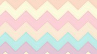 Pastel chevron pattern in soft pink, cream, mint and lavender creates seamless geometric background. Zigzag stripes form continuous repeating design for fabric, wallpaper or digital use.
