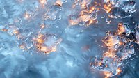 Fire flames burning on water surface creating dramatic contrast between orange fire and blue water with smoke and steam effects.