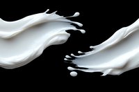 Dynamic white liquid splash with smooth flowing curves and droplets against black background, creating elegant motion effect for cosmetic and dairy advertising.