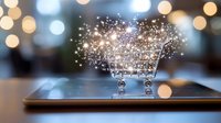 Shopping cart with glowing sparkles emerging from digital tablet screen against blurred bokeh background, representing online shopping and digital commerce.