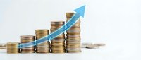 Stacks of golden coins arranged in ascending order with blue upward arrow showing financial growth, investment success and profit increase concept.