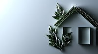 Minimalist house shape with green foliage and geometric frame on neutral background, representing eco-friendly home design and sustainable living concepts.