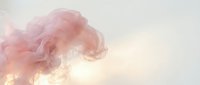Soft pink smoke swirls against light background creating dreamy atmospheric effect for creative projects and artistic designs.