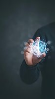 Hand holding glowing digital network structure with connected lines and nodes, representing technology, data connection, artificial intelligence, and innovation concepts for business solutions.