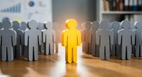 Outstanding leader figure glowing among team members in modern office environment symbolizing leadership excellence and career advancement opportunities.