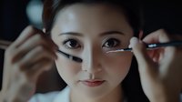 Young Asian woman applying black eyeliner makeup with precision, close-up beauty routine, cosmetics application, skincare and glamour lifestyle.
