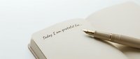 Today I am grateful for... written in a journal with a fountain pen on cream paper, suitable for gratitude practice, mindfulness content, wellness blogs, and personal development materials.
