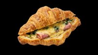 Flaky croissant sandwich filled with ham, melted cheese, and greens, isolated on transparent background. Ready for menu design, stickers, t-shirt design, and print on demand.