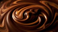Swirling chocolate liquid with rich brown tones and glossy highlights, creating an abstract fluid motion effect suitable for food, beverage, and confectionery design projects.