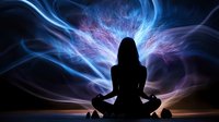 Silhouette of woman meditating against cosmic energy background with glowing blue and purple light waves, representing spiritual awakening and mindfulness practice.