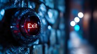 Glowing red exit sign button on dark textured background with blurred bokeh lights, creating dramatic atmosphere for emergency and safety concepts.