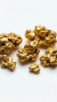 Raw gold nuggets scattered on white background showing natural metallic texture and irregular shapes for mining and investment concepts.