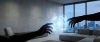 Business hands reaching toward glowing digital sphere in modern office space representing technology connection and innovation in corporate environment.