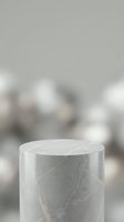 Gray marble cylinder podium with natural stone veining on blurred neutral background for product display and presentation mockups.