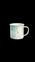Rustic ceramic mug with speckled teal and cream glaze, isolated on transparent background. Ready for t-shirt designs, clipart, stickers, print-on-demand products, and sublimation projects.