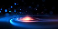Glowing spiral of blue and orange light against dark background with floating particles creates cosmic atmosphere for space-themed designs and presentations.