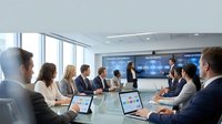 Business team meeting in modern conference room with female presenter at digital display board discussing data analytics and strategy.