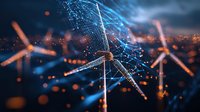 Wind turbines with glowing digital network connections against dark sky, illuminated by blue light streams and orange bokeh effects, representing renewable energy technology.
