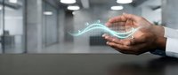 Businessman holding glowing digital wave in hands, representing data flow, technology innovation, and future business solutions in modern office environment.