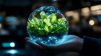 Glowing crystal ball with green plants inside held in palm against dark background, magical sphere with nature reflection creates ethereal environmental concept.
