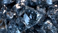 Macro shot of raw dark blue metallic mineral crystals with rough surface texture and reflective facets showing natural geometric formation patterns in geology study.