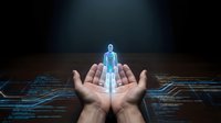 Holographic human figure projection floating above cupped hands with futuristic digital interface elements and glowing blue light effects on dark background.