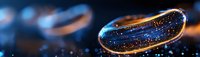 Macro view of golden water droplet with cosmic-like reflections on dark background, creating abstract natural art with bokeh light effects.