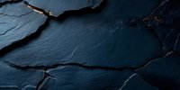 Dark cracked stone texture with dramatic lighting, rough surface and natural fractures creating abstract pattern on black slate background. Suitable for luxury branding.