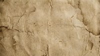 Cracked weathered stone surface with natural erosion patterns and rough texture for backgrounds and design projects.
