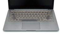 Laptop computer with open screen and illuminated keyboard on white background, isolated for web design, marketing materials, and technology presentations.