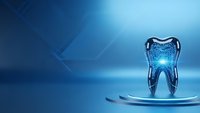 Futuristic digital tooth model glowing with blue light on circular platform against geometric background for dental technology and healthcare innovation concepts.
