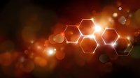 Glowing hexagonal shapes with connected lines on dark background with orange bokeh light effects and lens flares create modern technological atmosphere.