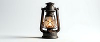 Vintage black metal oil lantern with warm glowing flame inside, casting ambient light. Suitable for rustic decor, camping, emergency preparedness, and nostalgic interior design projects.